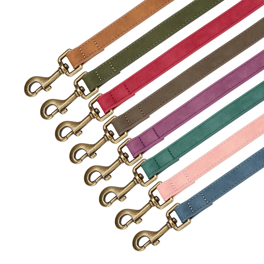 Custom PU leather dog harness and leash set with engraved ID buckle. Durable vest-style harness with matching lead rope, ideal for small and medium dogs, including bulldogs.
